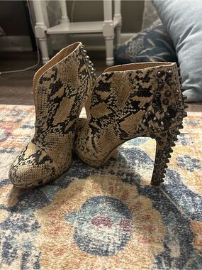 daria spiked python booties